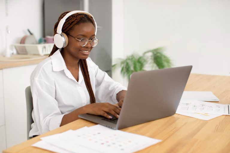 young-woman-working-with-her-headphones